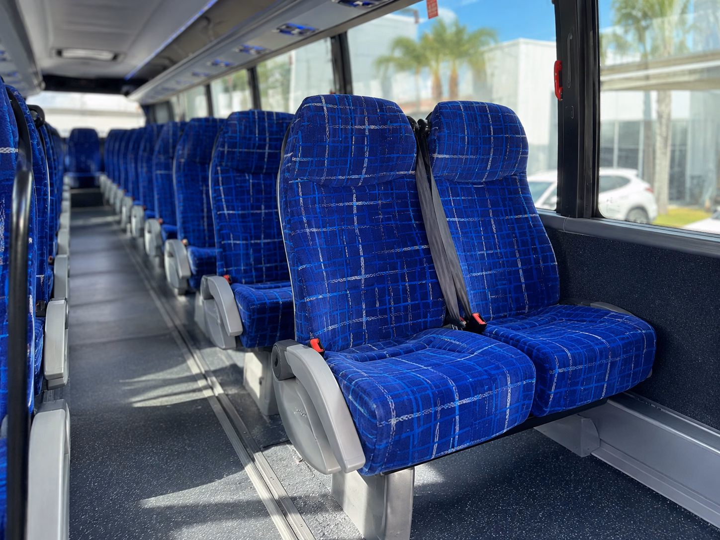 how starting location and deadhead affect charter bus rates in westland michigan